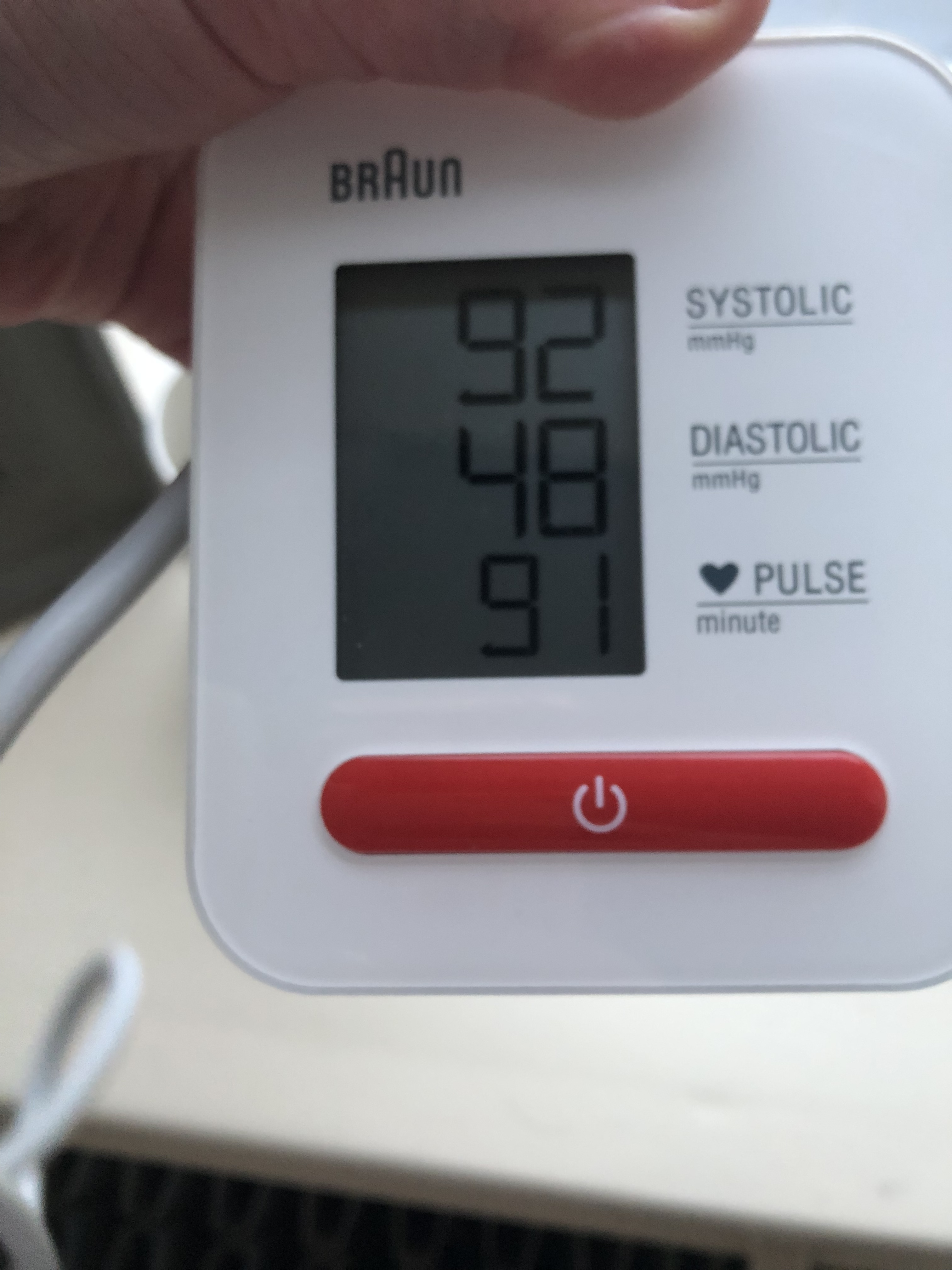 A blood pressure machine showing a low reading