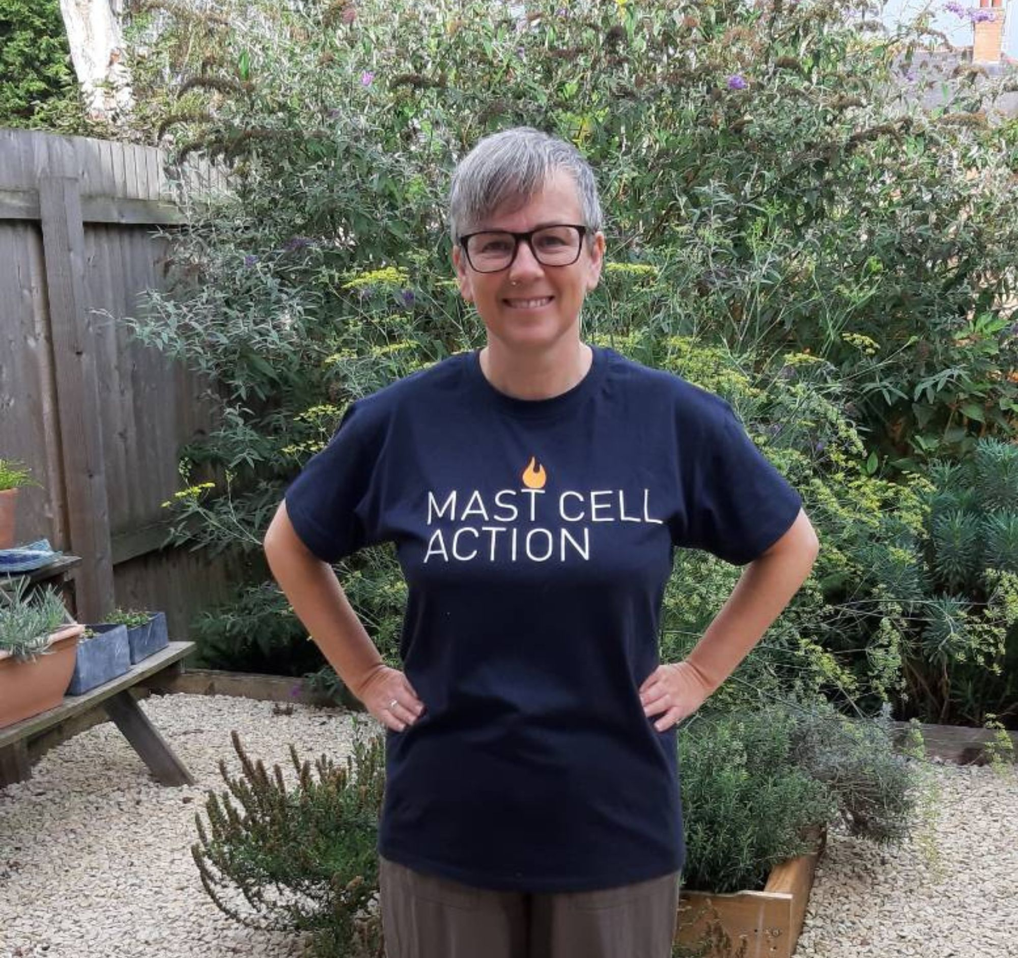 A lady wearing a Mast Cell Action t-shirt
